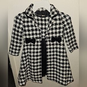 Cute black and white dress for toddler girl. Comes with jacket/coat.